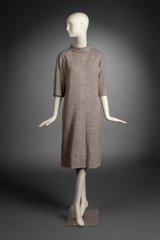 Givenchy Haute Couture Dress, 1968: Givenchy Haute Couture Dress, 1968 3/4 length sleeve dress in light grey wool boucle with shirt collar. Dress features zipper closure at center back, slash pockets at hips, patch pocket at the back, a