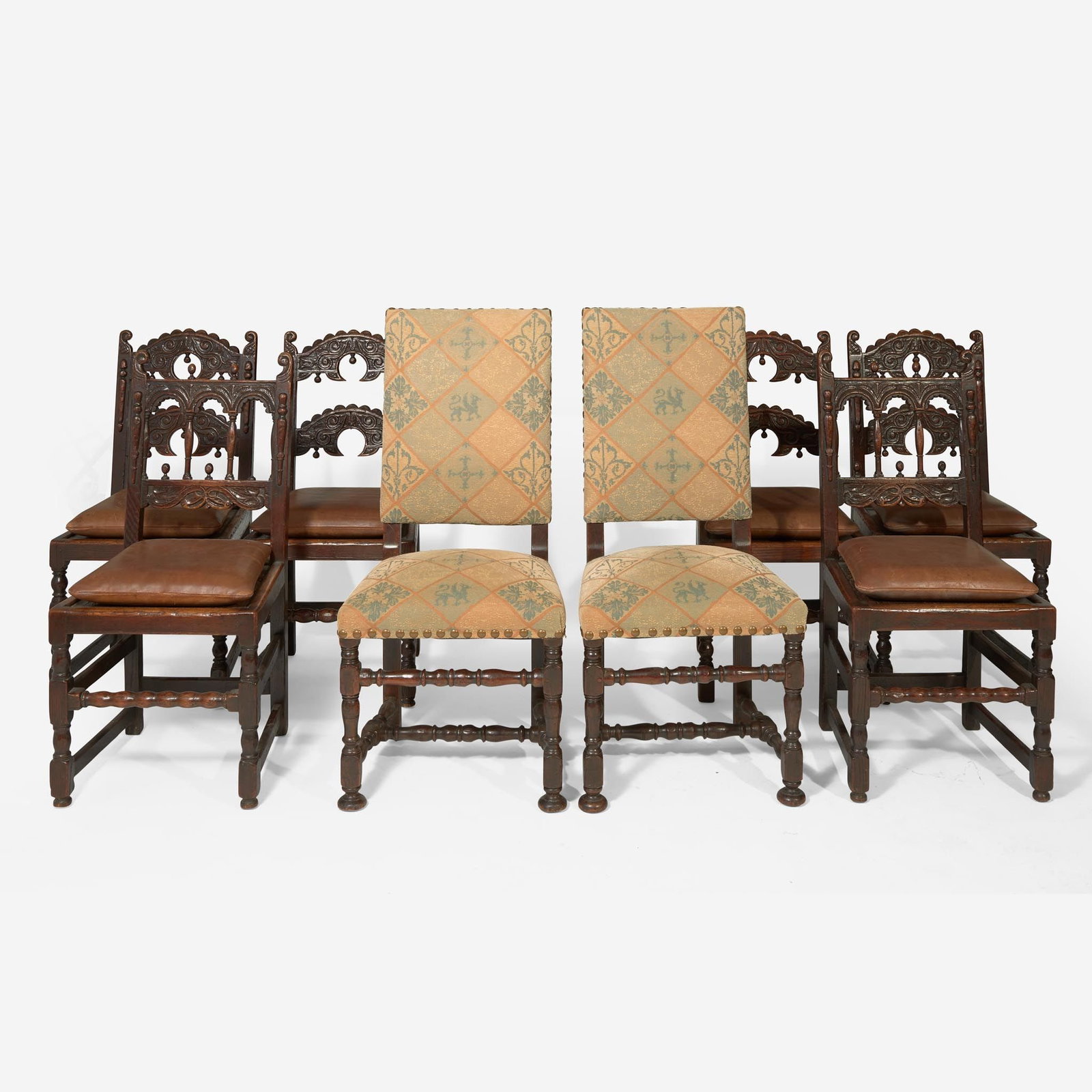 An assembled group of eight Baroque Revival oak and walnut dining chairs, late 19th / early 20th (1 of 3)