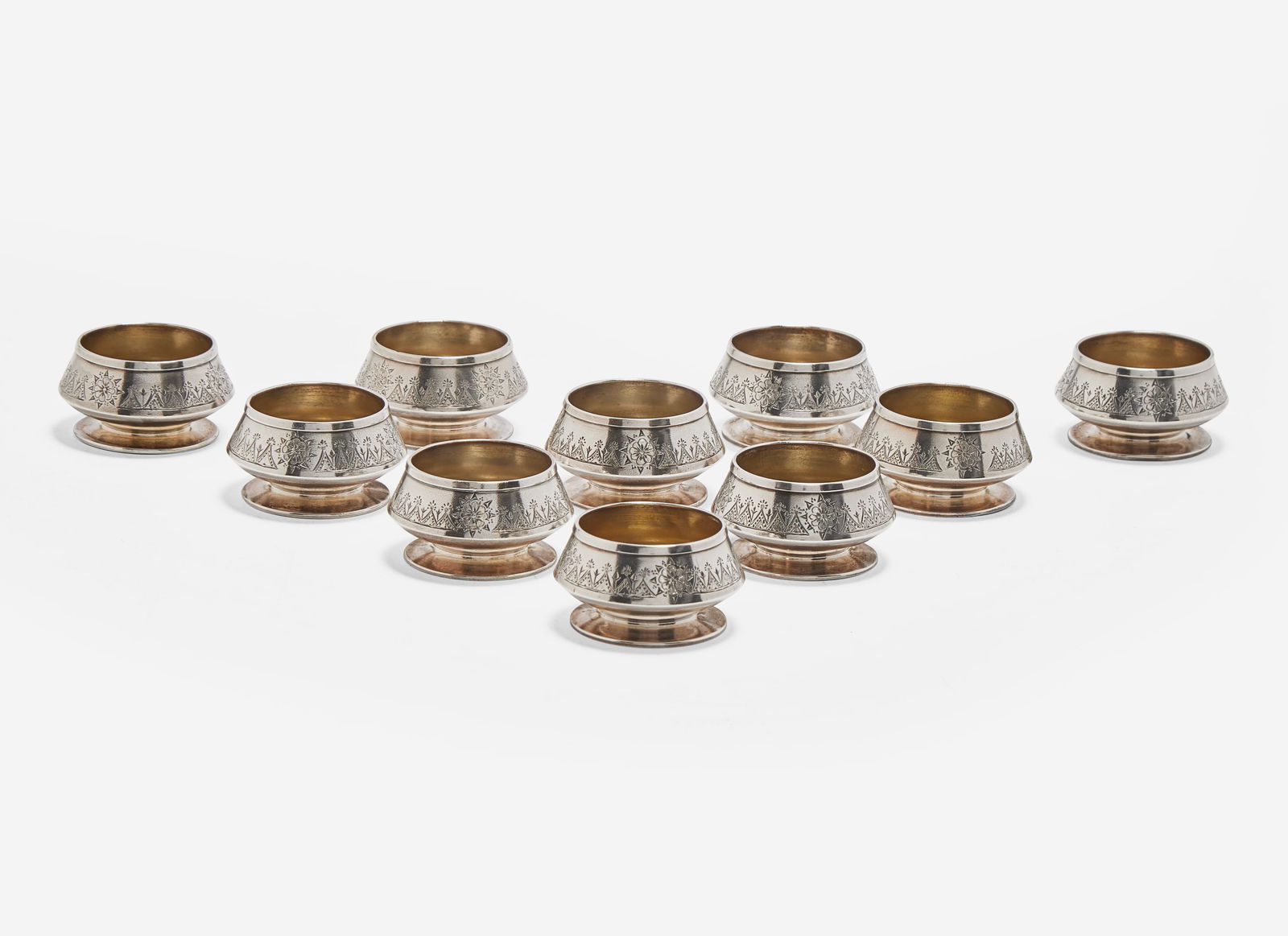 A set of ten Aesthetic Movement sterling silver salt cellars, Tiffany & Co., New York, NY, circa (1 of 2)