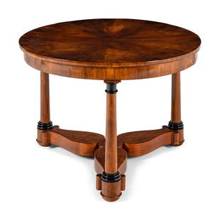 A German Part-Ebonized Walnut and Burl Maple Center Table: A German Part-Ebonized Walnut and Burl Maple Center Table Circa 1815-1825 Height 28 1/2 x diameter 40 1/2 inches. Provenance: Ritter Antik, New York.