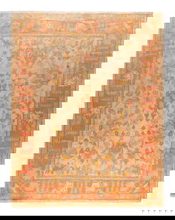 An Oushak Wool Rug: An Oushak Wool Rug West Anatolia, Late 19th Century 12 feet 2 inches x 9 feet 9 inches.