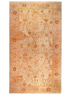 An Oushak Wool Carpet: An Oushak Wool Carpet Mid-20th Century 18 feet 5 inches x 10 feet 1 inch.