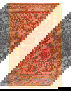 A Khotan Wool Rug: A Khotan Wool Rug Early 20th Century 6 feet 5 inches x 4 feet 4 inches.