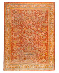 An Oushak Wool Rug: An Oushak Wool Rug West Anatolia, Late 19th Century 13 feet 1 inch x 10 feet.