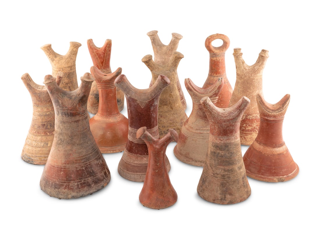 A Collection of Fourteen African Ceramic Headrests (1 of 10)