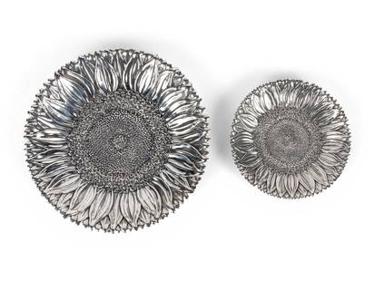 Two Buccellati Silver Sunflower Plates: Two Buccellati Silver Sunflower Plates each marked for Sterling 13 ozt 2 dwt gross Diameter of largest 8 inches.