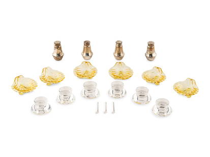 A Group of Salt Cellars: A Group of Salt Cellars comprising six Steuben glass examples, six shell-form glass examples and four weighted silver shakers. Height of first 1 1/2 x diameter 2 1/2 inches.