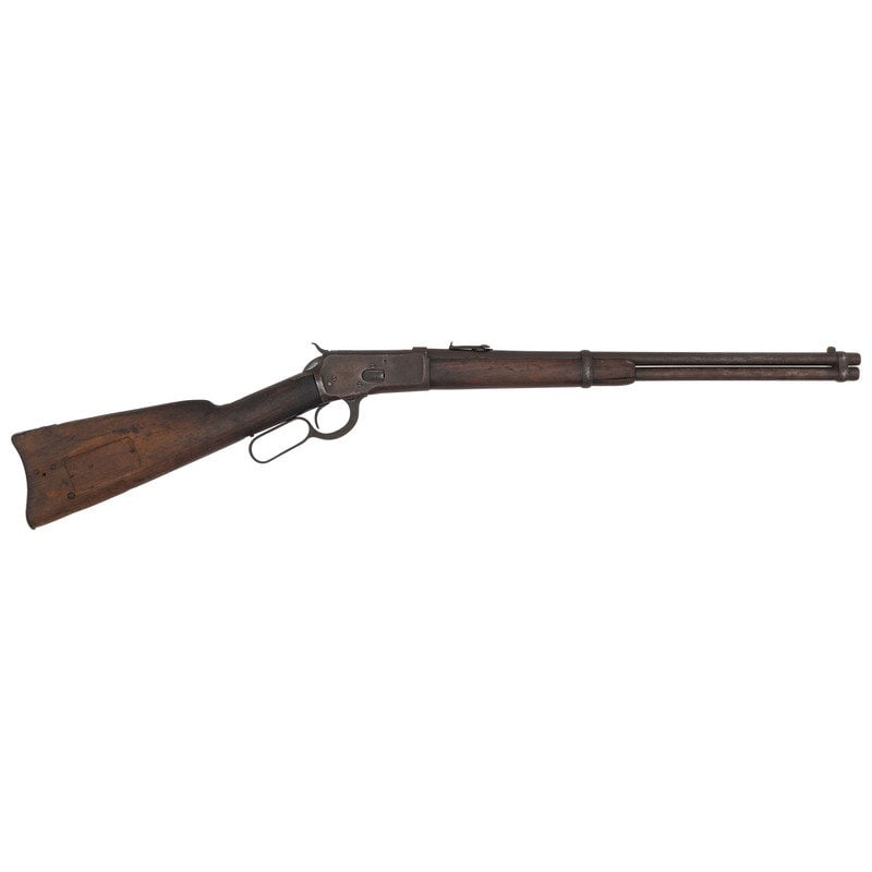 ** Winchester Model 1892 Saddle Ring Carbine: ** Winchester Model 1892 Saddle Ring Carbine Manufactured 1906 .44-40 WCF. 20" barrel length. SN: 349247. Blued metal finish with heavy patina. Walnut stock has a plain straight grip and forearm.