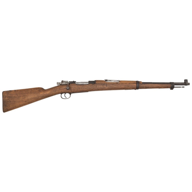 ** Spanish Mauser Model 1916 Short Rifle: ** Spanish Mauser Model 1916 Short Rifle 7x57mm. 21.7" barrel length. SN: S8546. Blued metal finish with a polished bolt and set in a straight wrist wood stock with half length upper handguard. Bolt-a