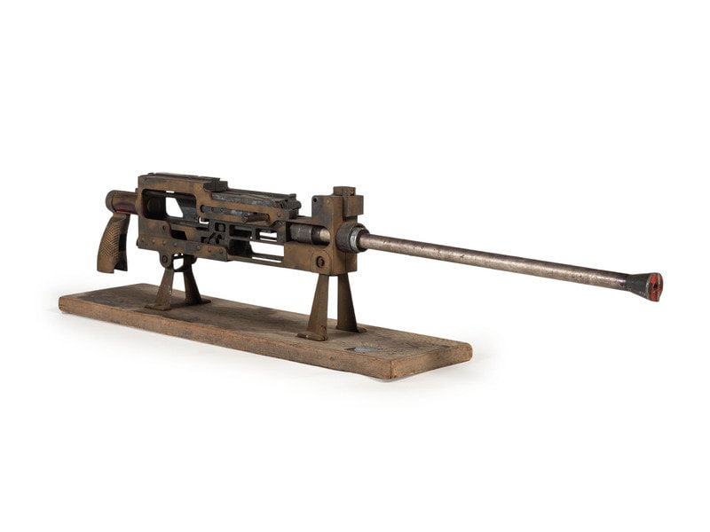 Enlarged Cutaway Trainer for Model 1919 Machine Gun: Enlarged Cutaway Trainer for Model 1919 Machine Gun .60" caliber. 42" barrel length. SN: 2187. OD Green spray painted finish overall with wood base and internal metal surfaces left in the white. Non-f