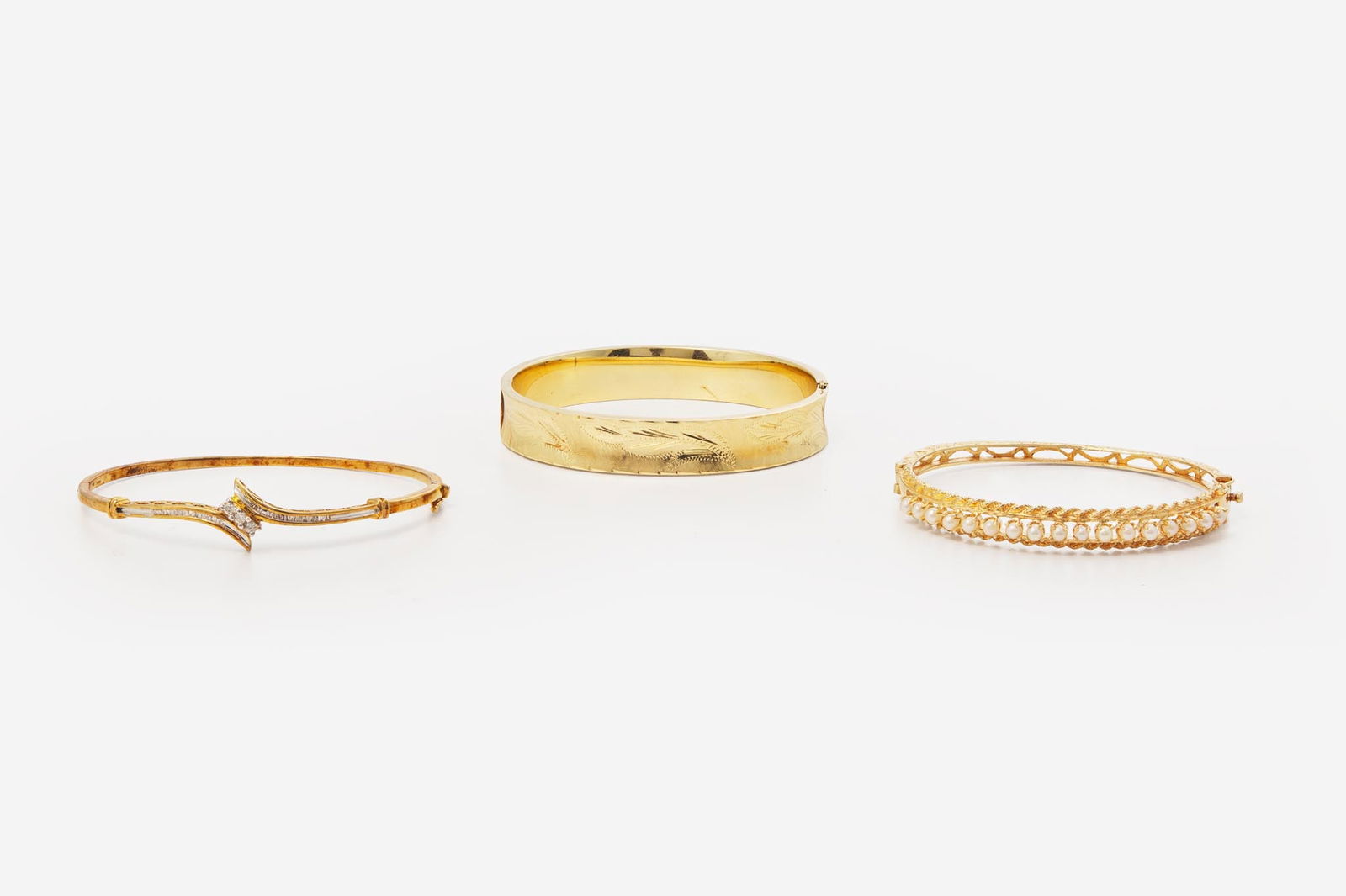 A Collection of Yellow Gold Bangles (1 of 2)