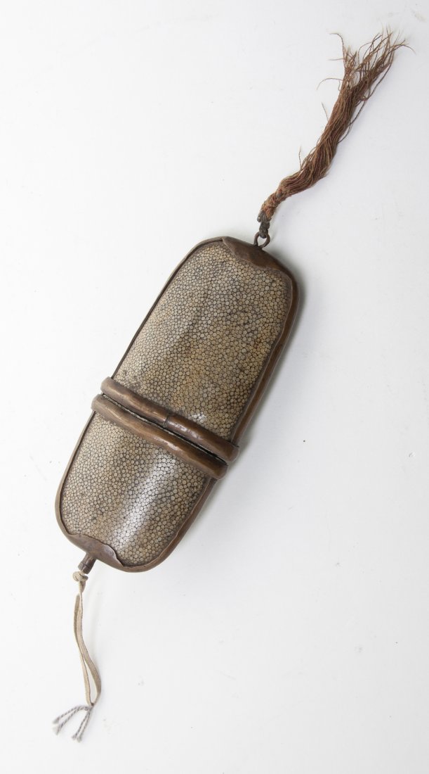 A Chinese Copper Mounted Shagreen Eyeglass Case, : A Chinese Copper Mounted Shagreen Eyeglass Case, of oval form, in two parts. Height 7 1/4 inches.