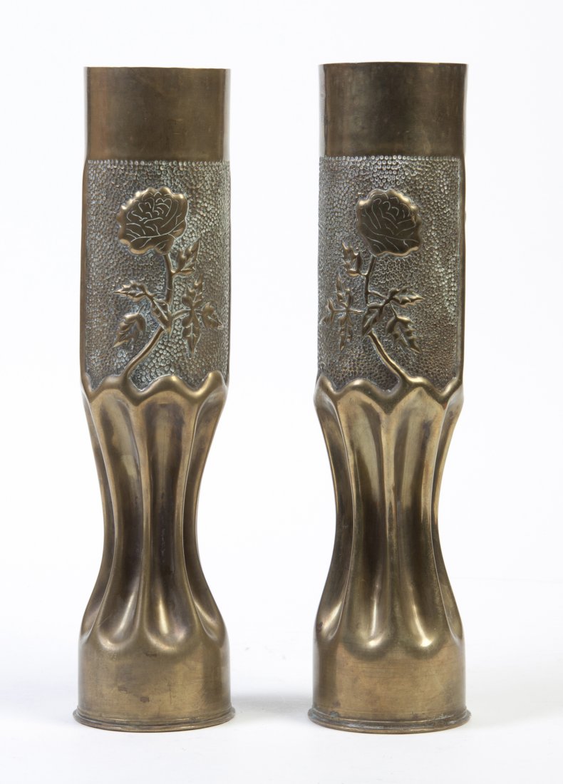 A Pair of Trench Art Vases, Height 13 1/2 inches.: A Pair of Trench Art Vases, of tapering cylindrical form, one side with a rose in relief, the other inscribed Verdun 1918 or Marne 1918. Height 13 1/2 inches. Property from the Estate of Corne