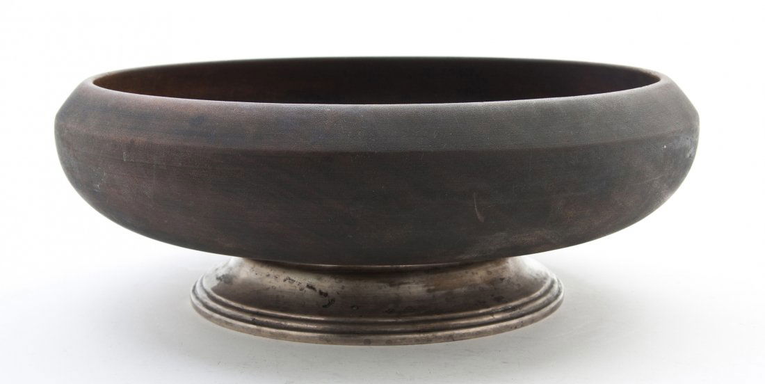 An American Sterling Silver Mounted Mahogany Cent: An American Sterling Silver Mounted Mahogany Center Bowl, of circular form with an inverted rim. Diameter 14 3/4 inches. Property from the Estate of Helen and C. Nicholas Johnson, Jr., Cave Creek, Ari