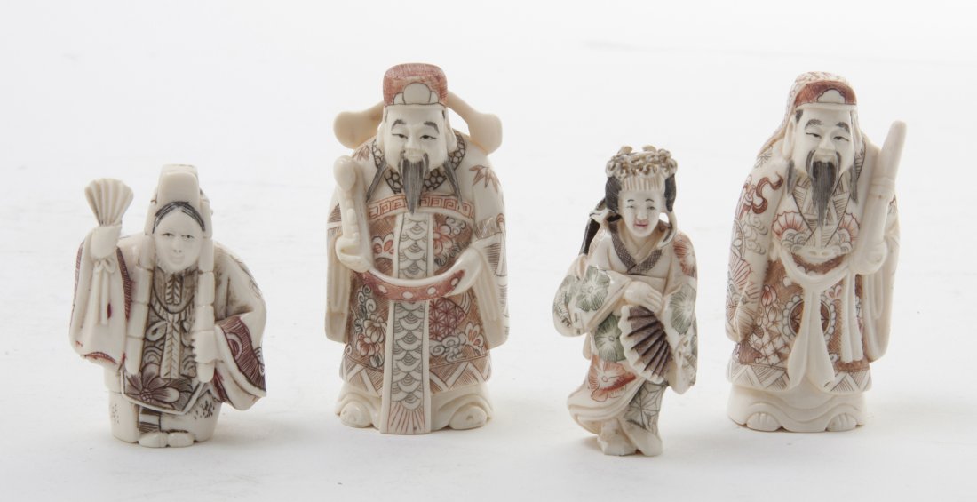Four Japanese Carved Ivory Articles, Height of ta: Four Japanese Carved Ivory Articles, each with polychrome decoration, comprising two okimono of immortals carrying their attributes and two netsuke, one depicting an actor with a fan, the other a lady