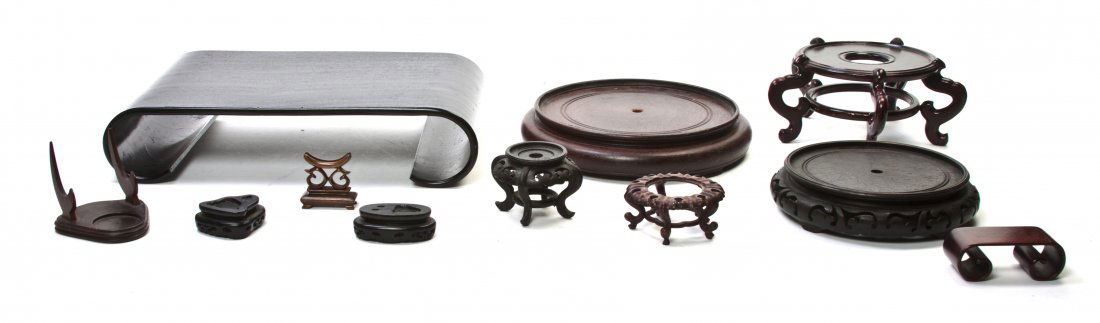 A Group of Asian Stands, Width of widest 15 inche: A Group of Asian Stands, of various shapes and sizes. Width of widest 15 inches.