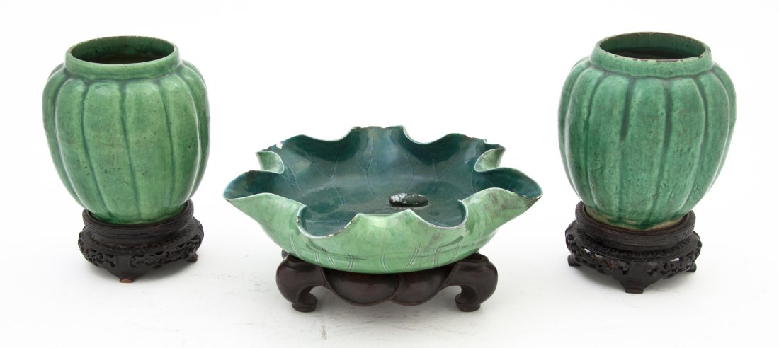 Three Chinese Glazed Ceramic Articles, Height of : Three Chinese Glazed Ceramic Articles, comprising a pair of melon vases and a lily pad form bowl with an applied cicada, each with a fitted stand. Height of tallest 5 1/2 inches. Property from the Est