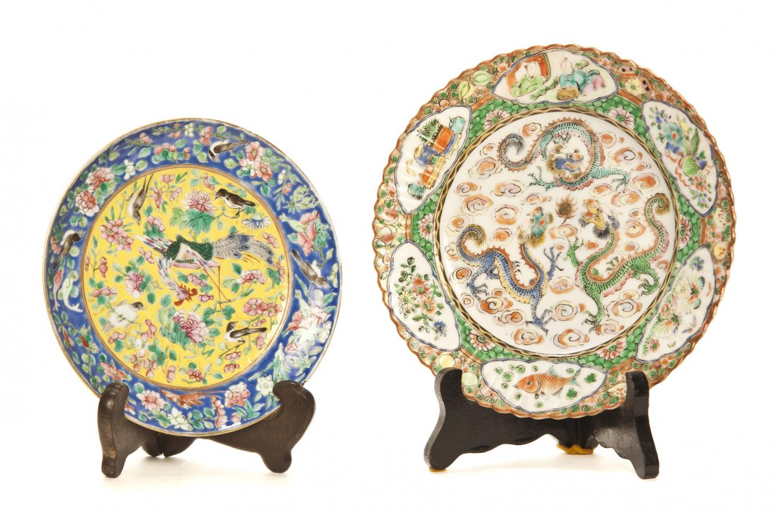 Two Chinese Porcelain Plates, Diameter of largest: Two Chinese Porcelain Plates, one decorated with three writhing dragons encircling a flaming pearl, with a scalloped rim around reserves of emblems and figures, the other centered with a phoenix with