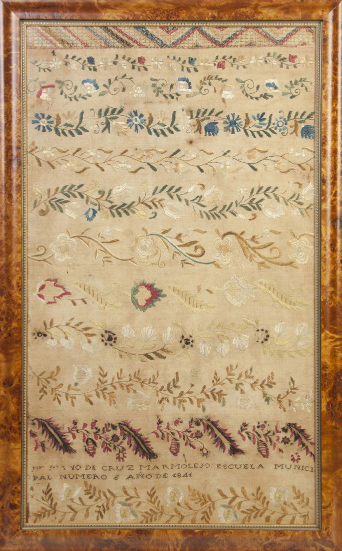 An American Needlepoint Sampler, Height 30 x widt: An American Needlepoint Sampler, 1844, worked on a linen ground with tiers of scrolling flowering vines, signed and dated in Spanish. Height 30 x width 18 3/4 inches.
