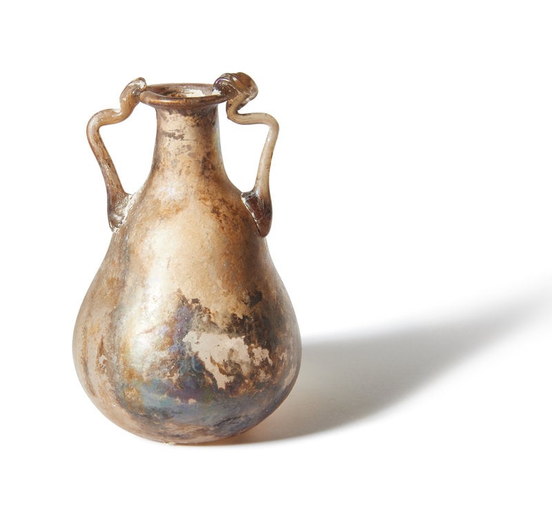 
A Roman Pale Yellow Glass Bottle (1 of 3)