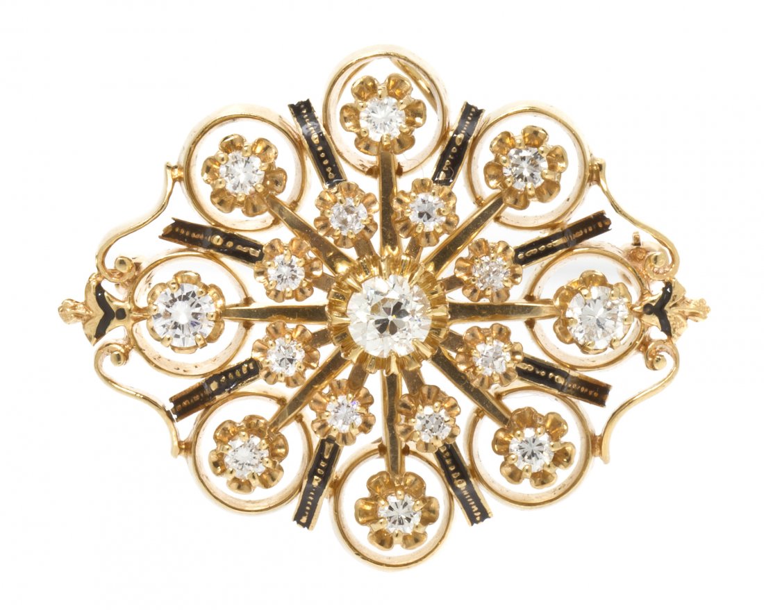 A Vintage 14 Karat Yellow Gold, Diamond and Enamel: A Vintage 14 Karat Yellow Gold, Diamond and Enamel Brooch, in an open wirework design containing 17 old European and round brilliant cut diamonds weighing approximately 1.82 carats total, black enamel