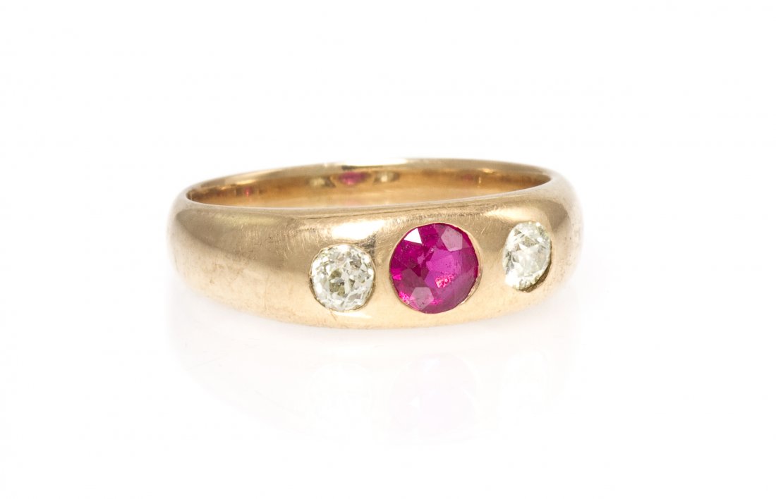 An Edwardian Yellow Gold, Ruby and Diamond Band, 3: An Edwardian Yellow Gold, Ruby and Diamond Band, containing one round brilliant cut ruby weighing approximately 0.33 carat and two old European cut diamonds weighing approximately 0.25 carat total. 3.
