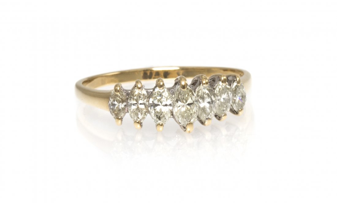 A 14 Karat Yellow Gold and Diamond Ring, 1.40 dwts: A 14 Karat Yellow Gold and Diamond Ring, containing five graduated marquise shaped diamonds weighing approximately 0.72 carat total. Stamp: 14K CT. 1.40 dwts.