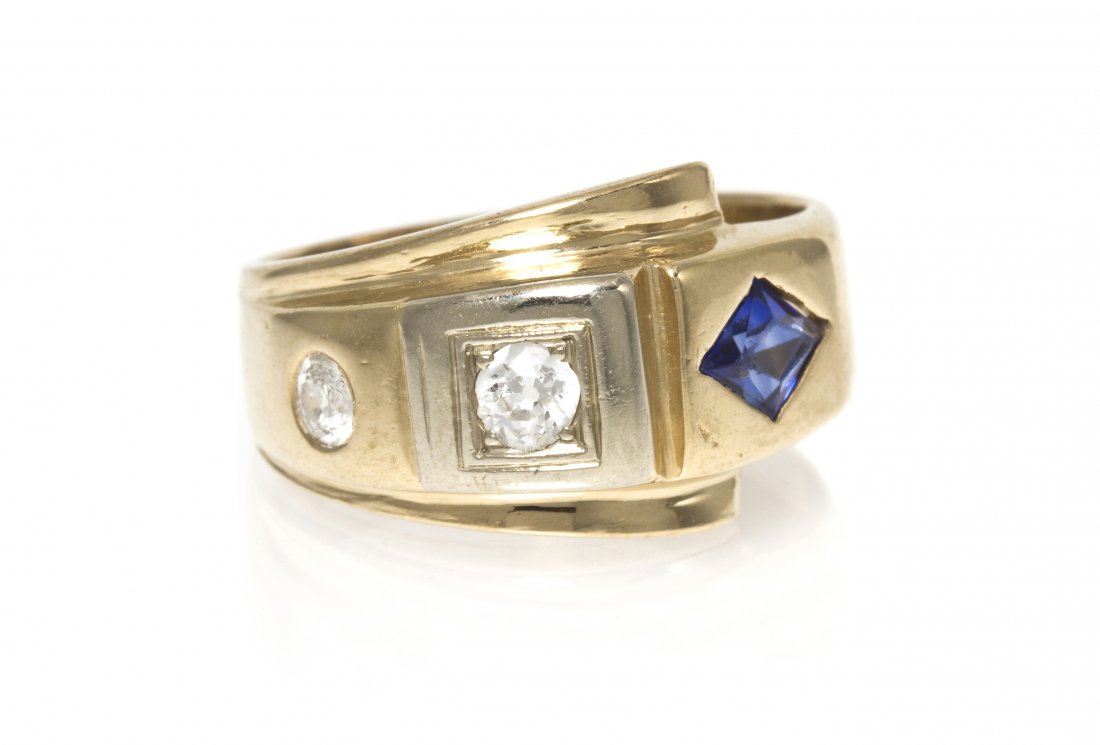 A Retro 14 Karat Yellow Gold, Diamond and Syntheti: A Retro 14 Karat Yellow Gold, Diamond and Synthetic Sapphire Ring, containing two old European cut diamonds weighing approximately 0.30 carat total and one lozenge shape synthetic sapphire. Stamp: 14K