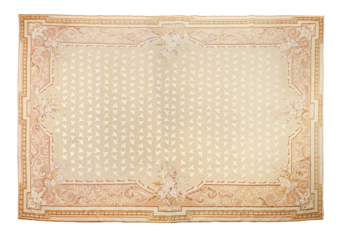 A Rose and Beige Colored Aubusson Rug, 11 feet 8 i: A Rose and Beige Colored Aubusson Rug, having a central floral medallion and set within one border. 11 feet 8 inches x 8 feet 11 inches.