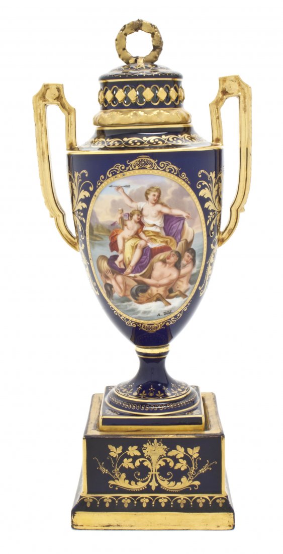 A Royal Vienna Porcelain Cobalt Urn on Stand, Heig: A Royal Vienna Porcelain Cobalt Urn on Stand, having a reticulated lid with a wreath form finial over the tapering body with two applied handles, one side depicting Triumph der Venus and Amor und Peph