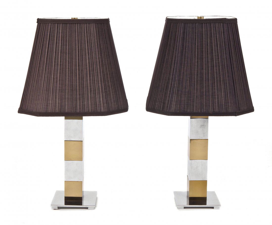 A Pair of American Brass and Chrome Table Lamps, H: A Pair of American Brass and Chrome Table Lamps, in the manner of Paul Evans, having a square standard with alternating sections, raised on a square base set on four feet. Height 26 inches. Property f