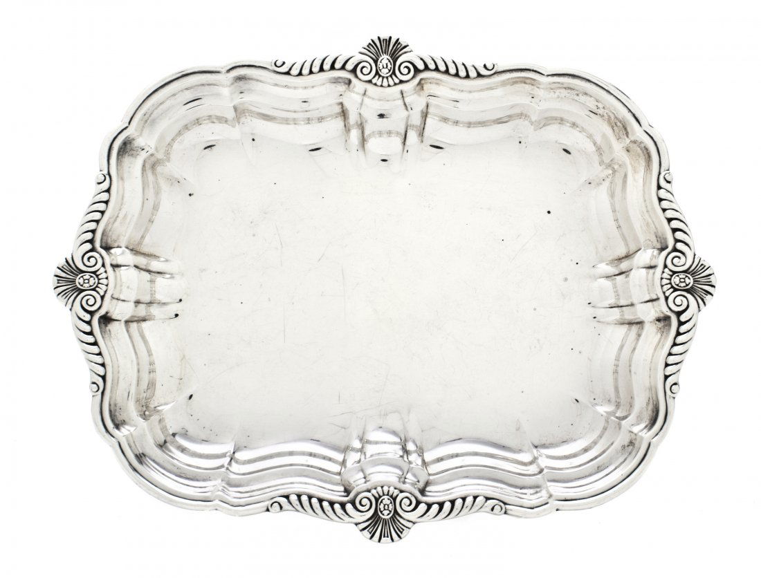 An American Sterling Silver Tray, International, D: An American Sterling Silver Tray, International, of shaped rectangular form with shell and foliate decoration; approximate weight 21.94 ozt. Diameter 12 3/4 inches. Property from the Estate of a Unite