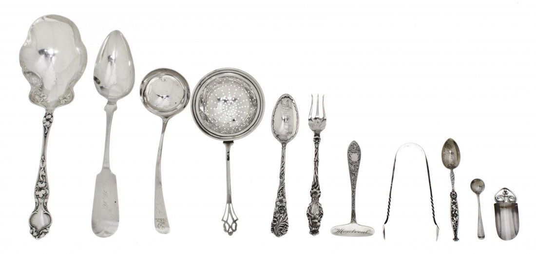A Group of American Sterling Silver Flatware Artic: A Group of American Sterling Silver Flatware Articles, comprising seven various spoons, a ladle, two cocktail forks, an olive fork, two salt spoons, a salt scoop, a tea strainer, a serving spoon and a