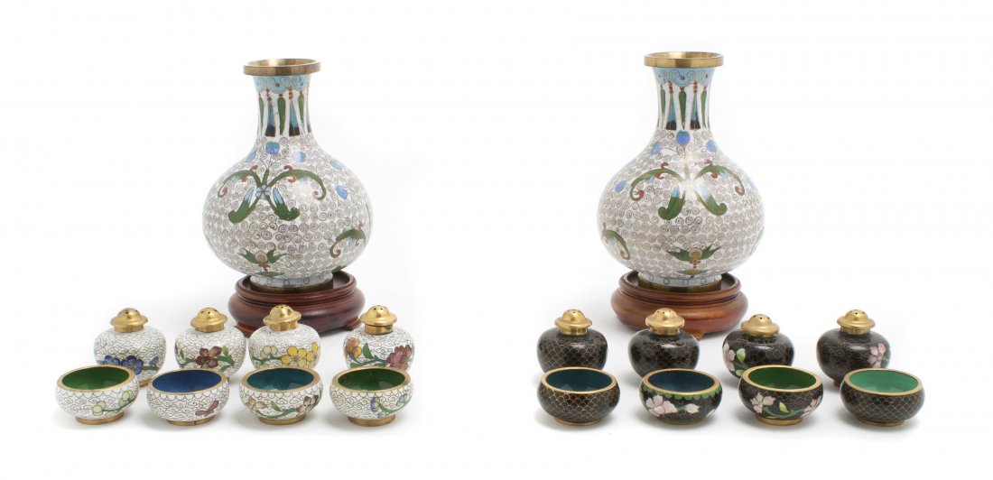 A Collection of Chinese Cloisonne Articles, Height: A Collection of Chinese Cloisonne Articles, comprising a pair of bulbous form vases raised on hardwood stands, together with eight salt cellars and eight casters each with scrolling foliate decoration