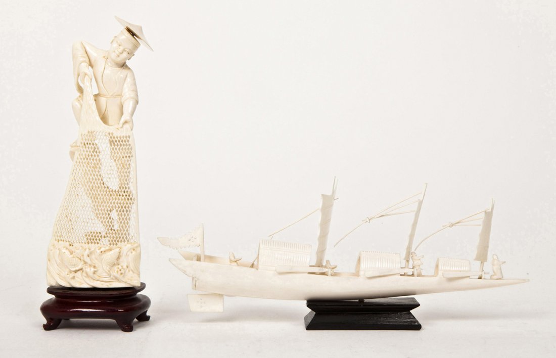 A Carved Ivory Model of a Boat, Height of taller 8: A Carved Ivory Model of a Boat, having three sails, together with a carved ivory fisherman holding his net, mounted on a hardwood base. Height of taller 8 1/4 inches.