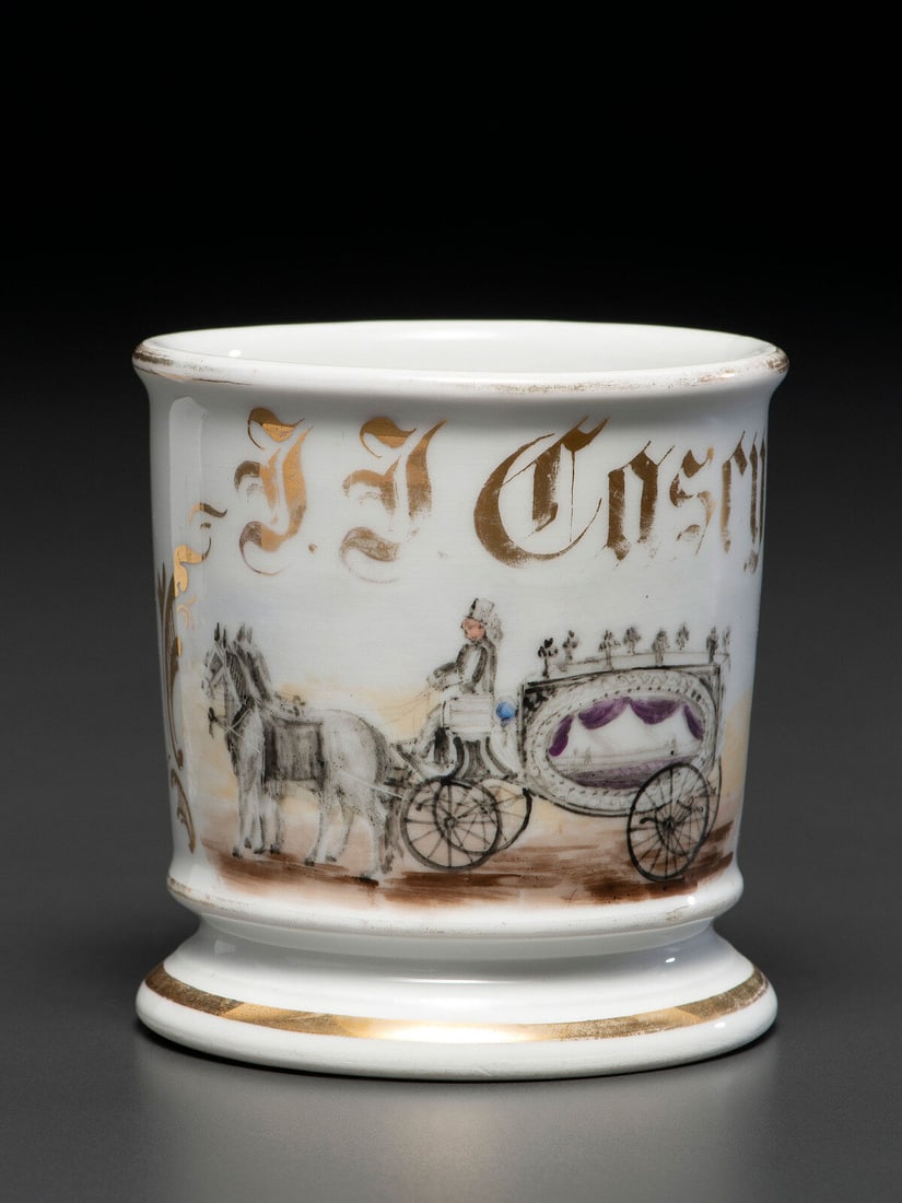 A Porcelain Occupational Shaving Mug Depicting a Horse-Drawn Hearse (1 of 3)