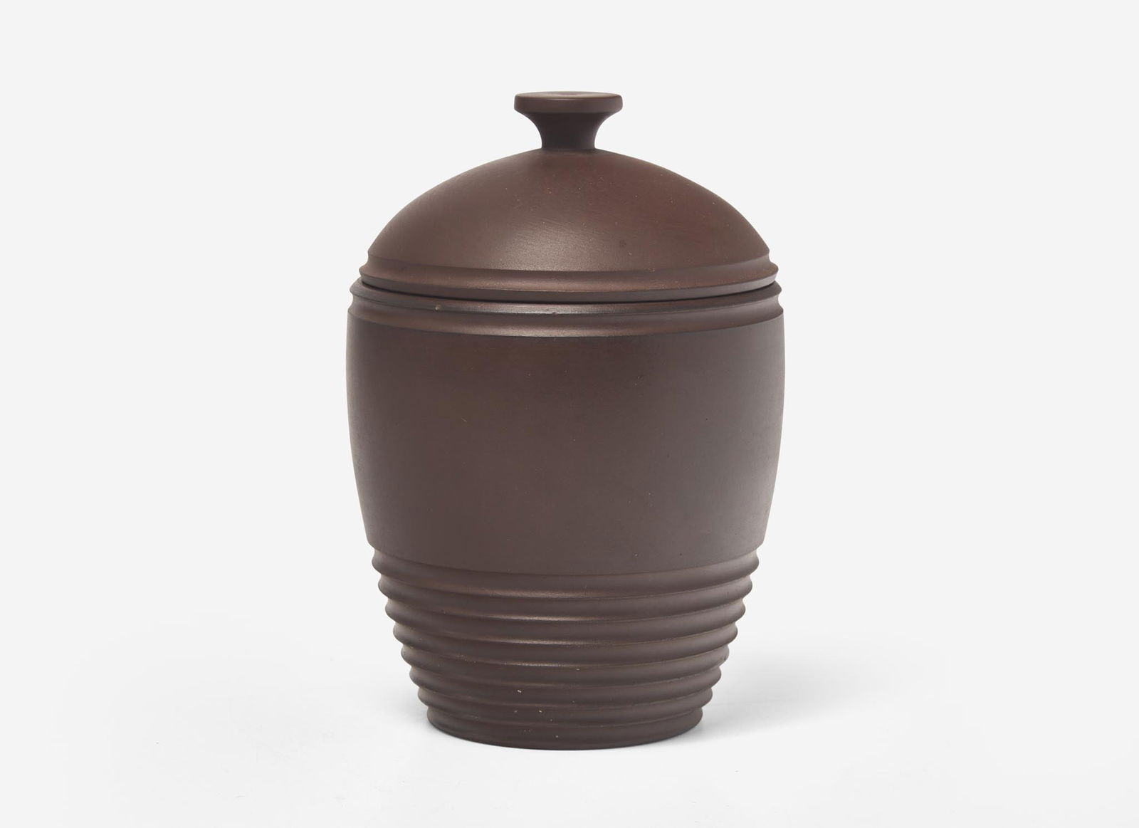A Wedgwood Bronzed Basalt Tobacco Jar, UK, 1930s: A Wedgwood Bronzed Basalt Tobacco Jar, UK, 1930s Designed by Keith Murray (1892-1981); missing inner lid Impressed "WEDGWOOD" "MADE IN ENGLAND", printed "Keith Murray" signature Wedgwood mark H: 6 5/8
