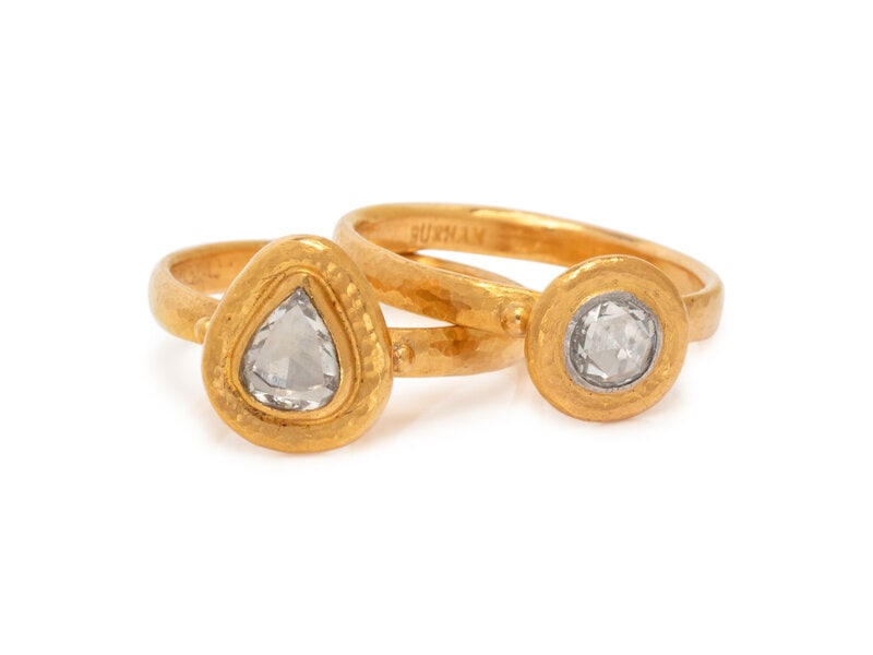 GURHAN, PAIR OF YELLOW GOLD AND ROSE CUT DIAMOND RINGS: GURHAN, PAIR OF YELLOW GOLD AND ROSE CUT DIAMOND RINGS Consisting of a ring containing one round rose cut diamond weighing approximately 0.28 carat, together with a ring containing one pear shaped ros