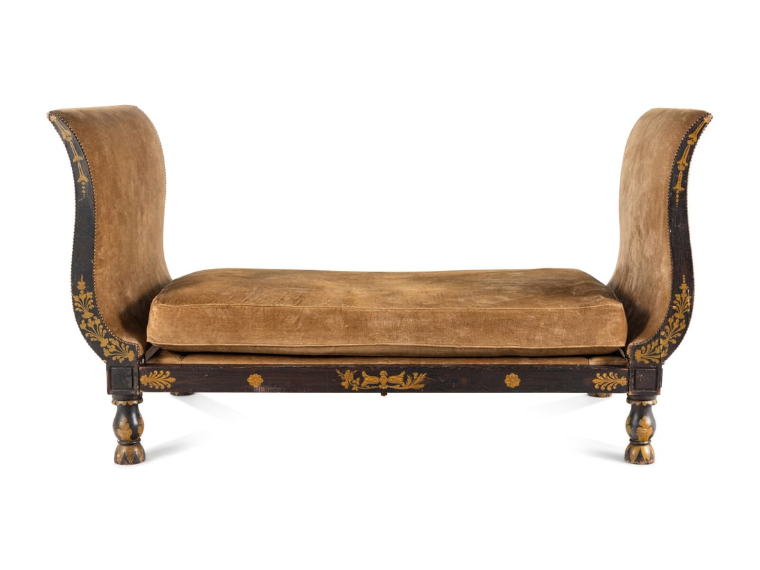An Empire Ebonized and Parcel Gilt Daybed: An Empire Ebonized and Parcel Gilt Daybed 19th Century Height 48 x width 86 x depth 42 inches. Property from a Private Collection, Little Rock, Arkansas