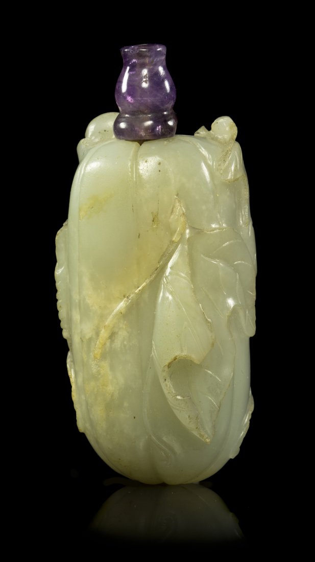 A Melon Form Jade Snuff Bottle, Height 2 7/8 inches.: A Melon Form Jade Snuff Bottle, of celadon colored stone with leafy tendrils and having a shaped amethyst stopper. Height 2 7/8 inches. Property from the Collection of Jean F. Schmidt, Chicago, Illino