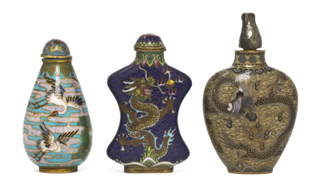 A Group of Three Cloisonne Snuff Bottles, Height of: A Group of Three Cloisonne Snuff Bottles, the first having waisted center with a sinuous five-clawed dragon chasing a flaming pearl on a blue reserve, having a four-character Qianlong mark on the unde