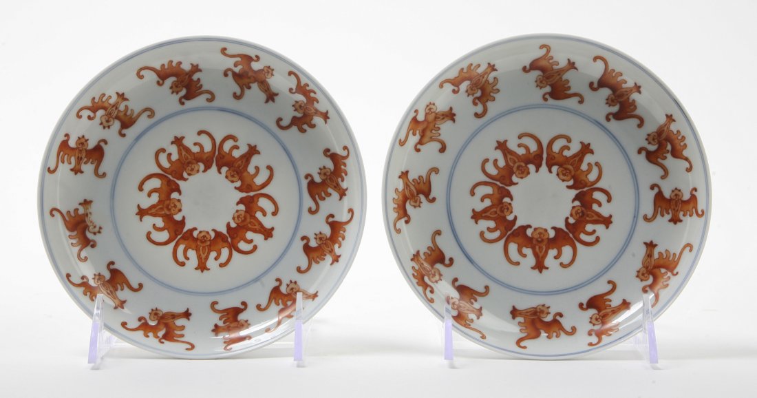 A Pair of Chinese Porcelain Dishes, Diameter 6 1/8: A Pair of Chinese Porcelain Dishes, the interior with overglaze red decoration of bats, having double blue ring around the center, the undersides with bats around the center and with Yongzheng reign m