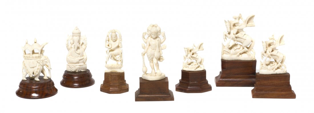 A Group of Seven Indian Carved Ivory Articles, Hei: A Group of Seven Indian Carved Ivory Articles, comprising a Lord Ganesha figure and two deity figures, three Western subject figures depicting Saint George on his horse and a figure modeled after a ho