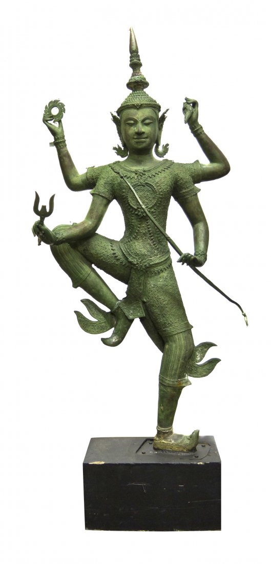 A Thai Bronze Figure, Height 82 inches.: A Thai Bronze Figure, 20th century, the figure depicted dancing with tiered headdress and holding various attributes including a bow. Height 82 inches. Property from the Estate of Dr. and Mrs. Gary an