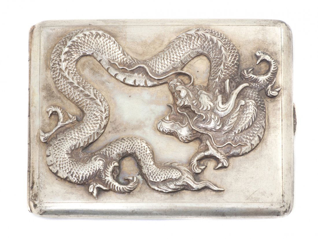 A Chinese Silver Cigarette Case, Zee Sung, Shangha: A Chinese Silver Cigarette Case, Zee Sung, Shanghai, of rectangular hinged form, having applied dragon decoration to the front and with a gilt interior, stamped with Zee Sung hallmark; approximate wei