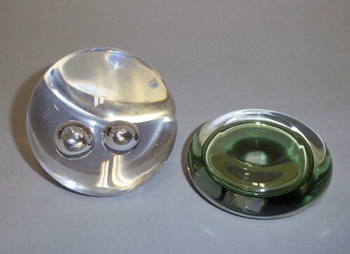 TWO SWEDISH ART GLASS PAPERWEIGHTS Blown: TWO SWEDISH ART GLASS PAPERWEIGHTS Blown glass; one by Goran Warff for Kosta Boda, h: 3 in., the other by Studio Thus(?), dia: 3 1/2 in.