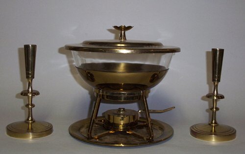 TOMMI PARZINGER FOR DORLYN CANDLESTICKS: TOMMI PARZINGER FOR DORLYN CANDLESTICKS & CHAFING DISH Brass, Pyrex glass; stamped mark to plate, height of sticks: 7 1/2 in., height of dish: 9 1/2 in.