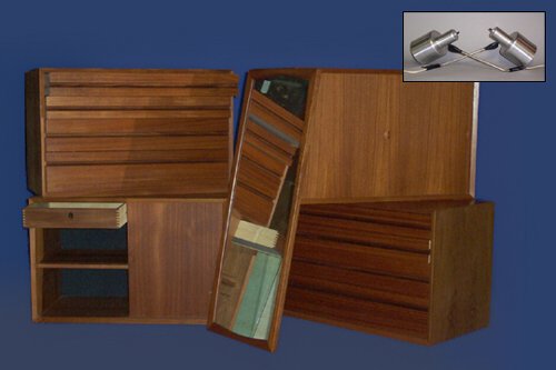 LARGE DANISH TEAK MODULAR WALL SYSTEM M: LARGE DANISH TEAK MODULAR WALL SYSTEM Manufactured by Aksel Kjersgaard Numerous pieces including chests, drop-front desk, lamps, mirror and wall brackets.
