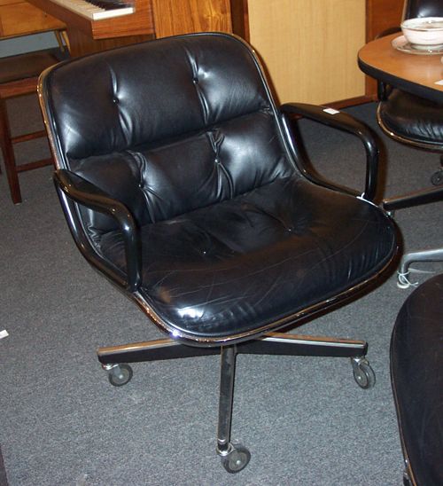 FOUR CHARLES POLLOCK FOR KNOLL ARMCHAIR: Aluminum, leather, plastic; Knoll International tags, each on castors, h: 31 3/4, w: 26, d: 19 3/4 in.