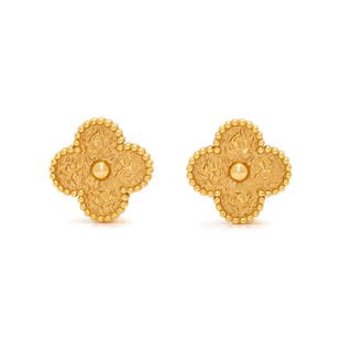 VAN CLEEF & ARPELS, YELLOW GOLD 'VINTAGE ALHABRA' EARCLIPS: VAN CLEEF & ARPELS, YELLOW GOLD 'VINTAGE ALHABRA' EARCLIPS Clover motif with textured finish, posts with clips backs. 15.00 mm wide. Stamp: VCA Au750 JB176468. Total gross weight: 5.70 dwt. 